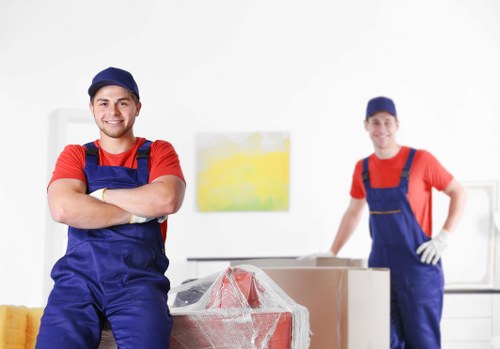 Moving team loading household items for a UK relocation service