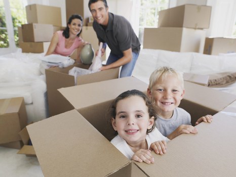 Office relocation planning in Mayfair with packed boxes and moving team