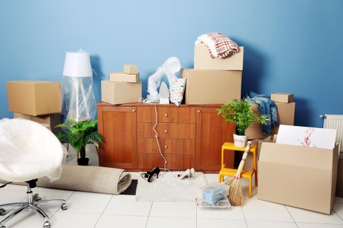 Packing materials and moving boxes prepared for a Mayfair home move