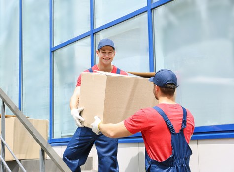 Careful loading of office furniture in central London