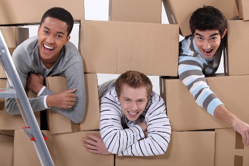 Removal team preparing a move in a Mayfair residential street