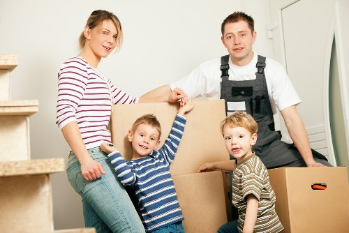 Removal van and moving team near a Mayfair townhouse