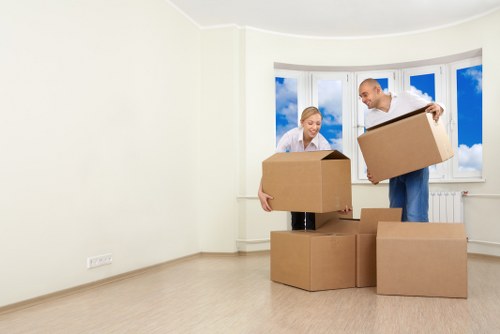 Removal professionals handling apartment access in Mayfair