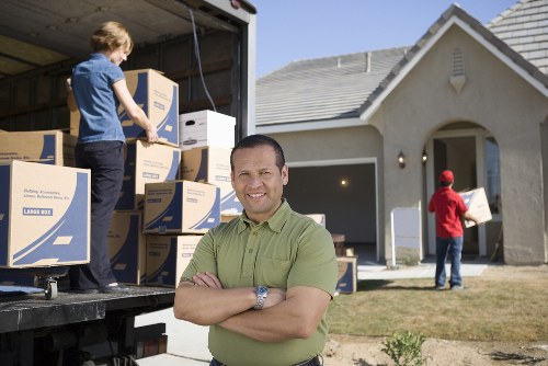 Careful handling of boxes and furniture in a central London property